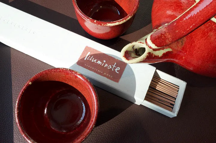 Red teacup and INCENZO incense box for a Taoist incense ritual