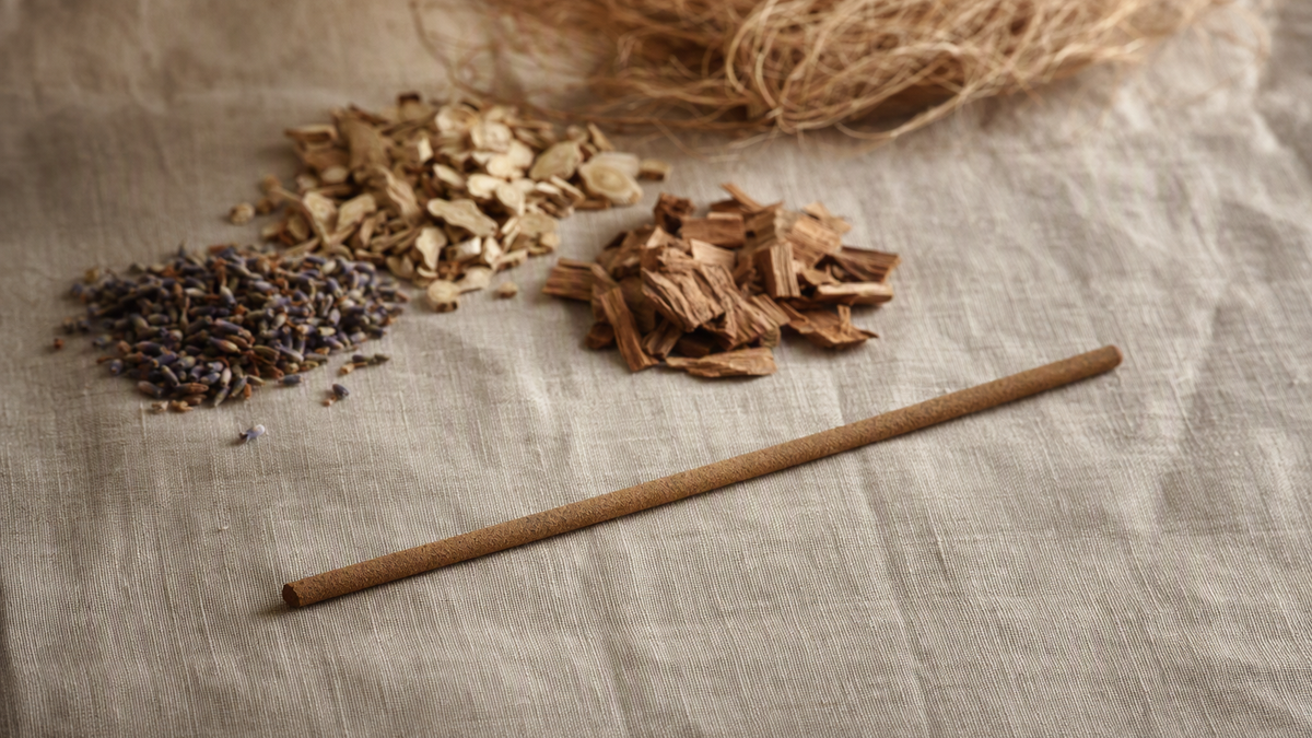 Incense with natural dried herbs and wood chips still life