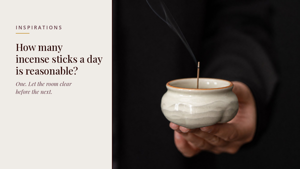 INCENZO blog header — How many incense sticks a day — a single lit stick in a Ru ware celadon burner held in one hand