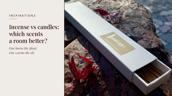 INCENZO blog header — Incense vs candles for scenting a room — Immerse jasmine and honey box on a sunlit stone with red maple leaves