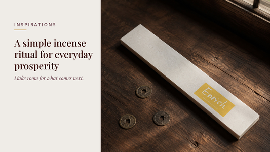 INCENZO blog header — A simple incense ritual for everyday prosperity — Enrich frankincense box beside three old copper coins on a wooden table
