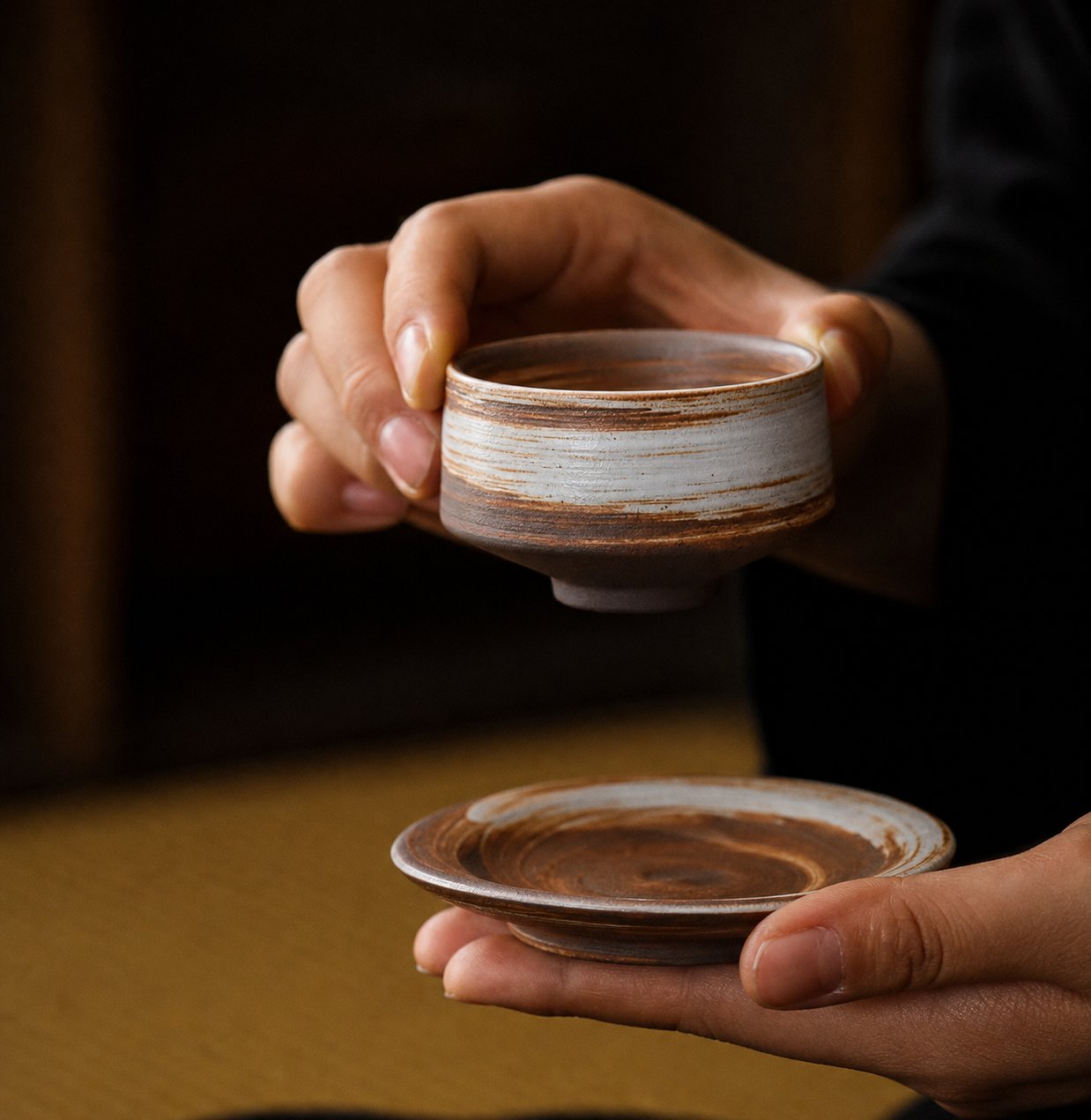 Coarse Stoneware Incense Ash Tray and saucer held by hand, text-free lifestyle detail