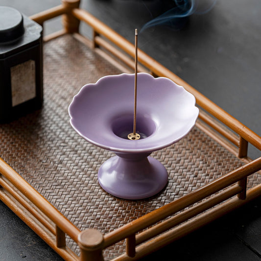 Lavender Ripple footed incense dish on a bamboo tray, copper nine-hole insert visible