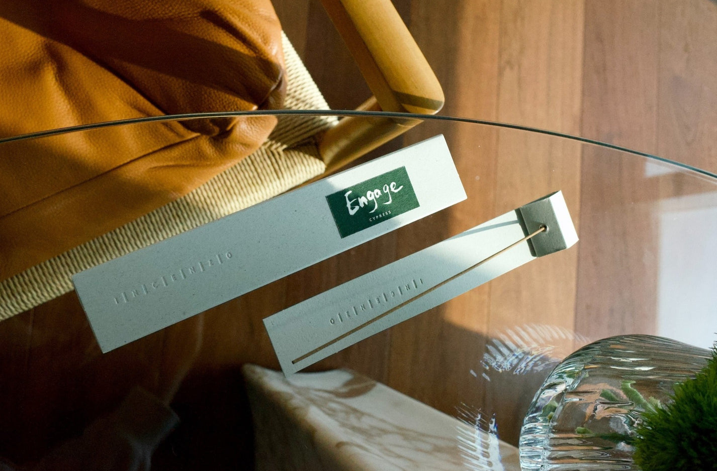 Engage Cypress natural incense box with incense sticks on a tea table
