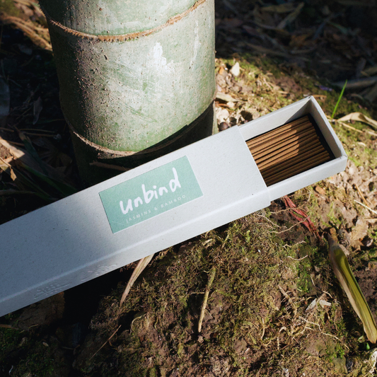 Box of jasmine and bamboo incense sticks  in the bamboo forest